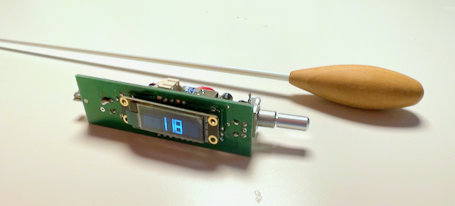 A traditional baton and its eventual technological replacement
